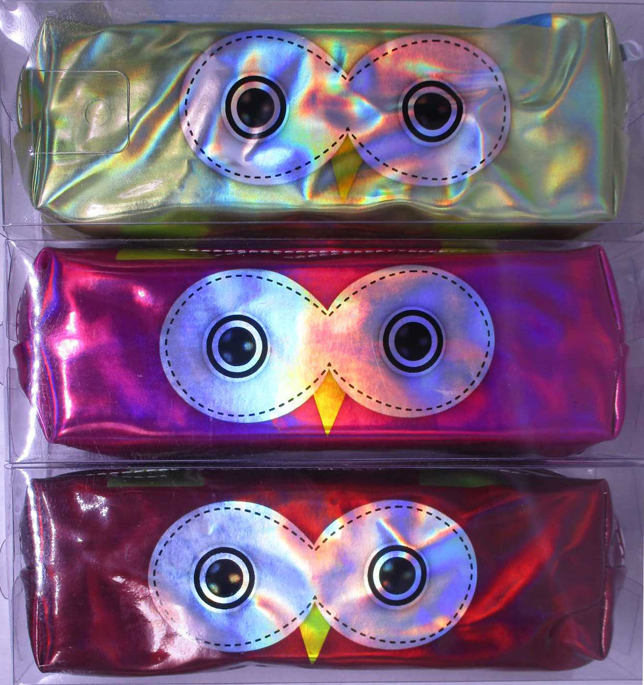 Holographic cosmetic pencil case. /533-10/ "Owl with big eyes" 3 editions, PVC pack (1/12)