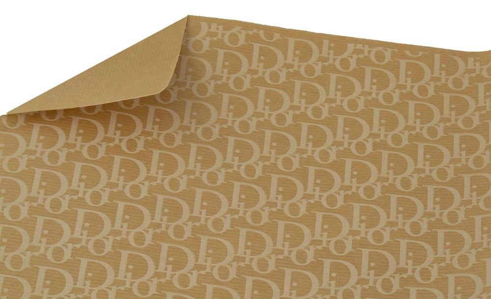 Папір пакувальний крафт двосторонній "Unison" /Пт 830.5/ "Dior" срібний шрифт на крафті, 0,7*7м , 1арк.